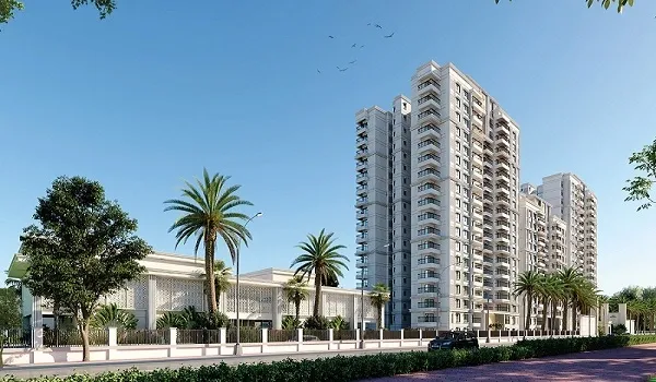 1, 2 & 3 BHK flats in Devanahalli – representative image Prestige Airport Road high-rise apartment towers with palm-lined boundary in Devanahalli